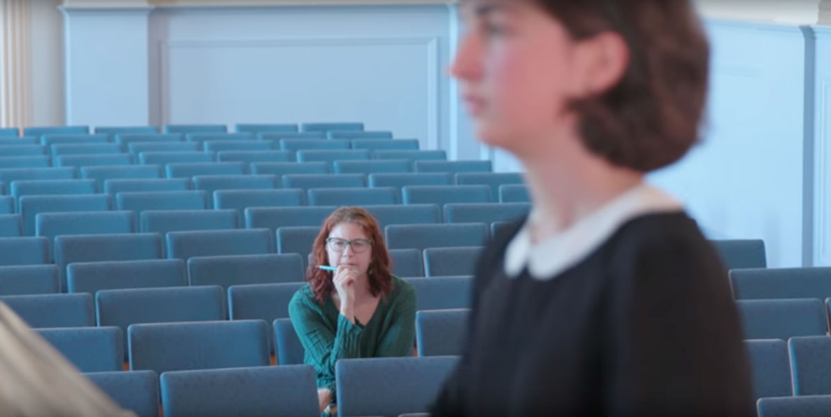 Two students in a music audition room