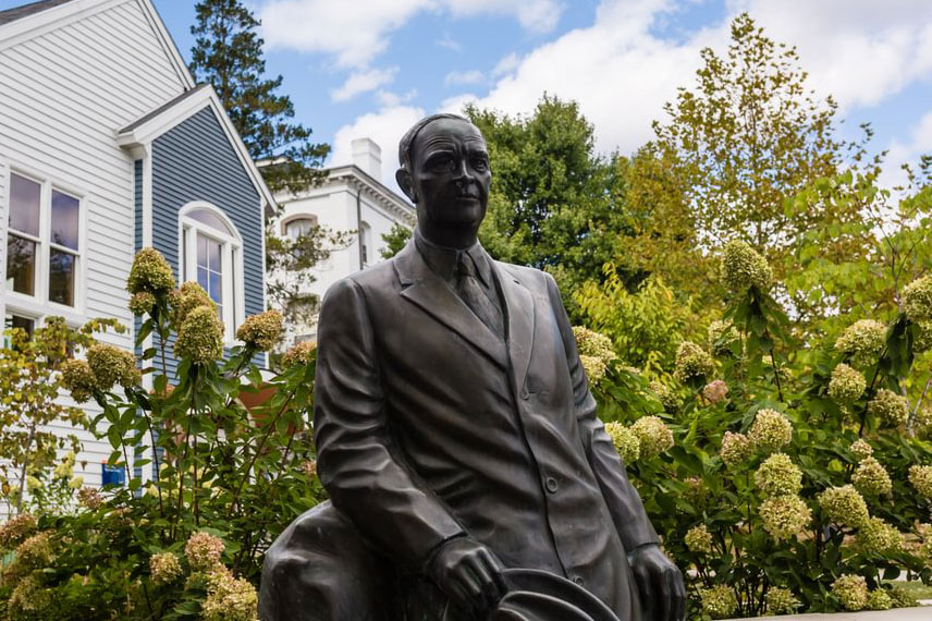 Statue of Dwight Eisenhower in front of the Admissions building