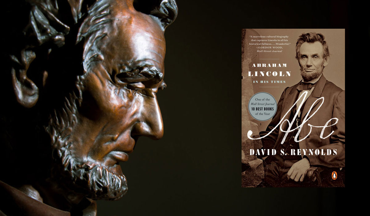 Bust of Abraham Lincoln with an image of the book jacket for Abe: Abraham Lincoln in His Times