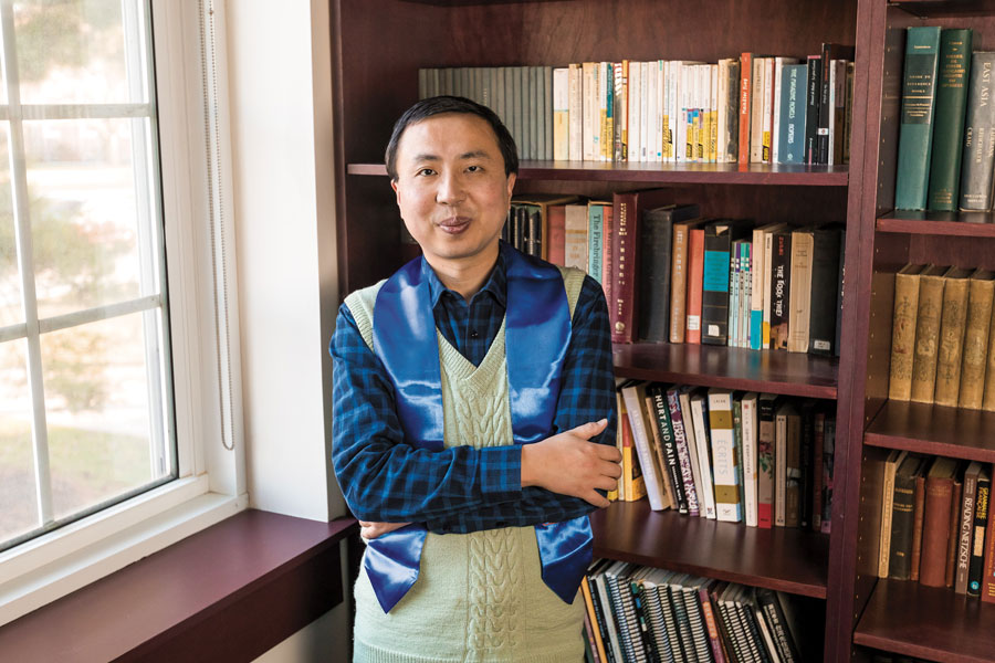 East Asian Studies Professor Junjie Luo with his stole of gratitude