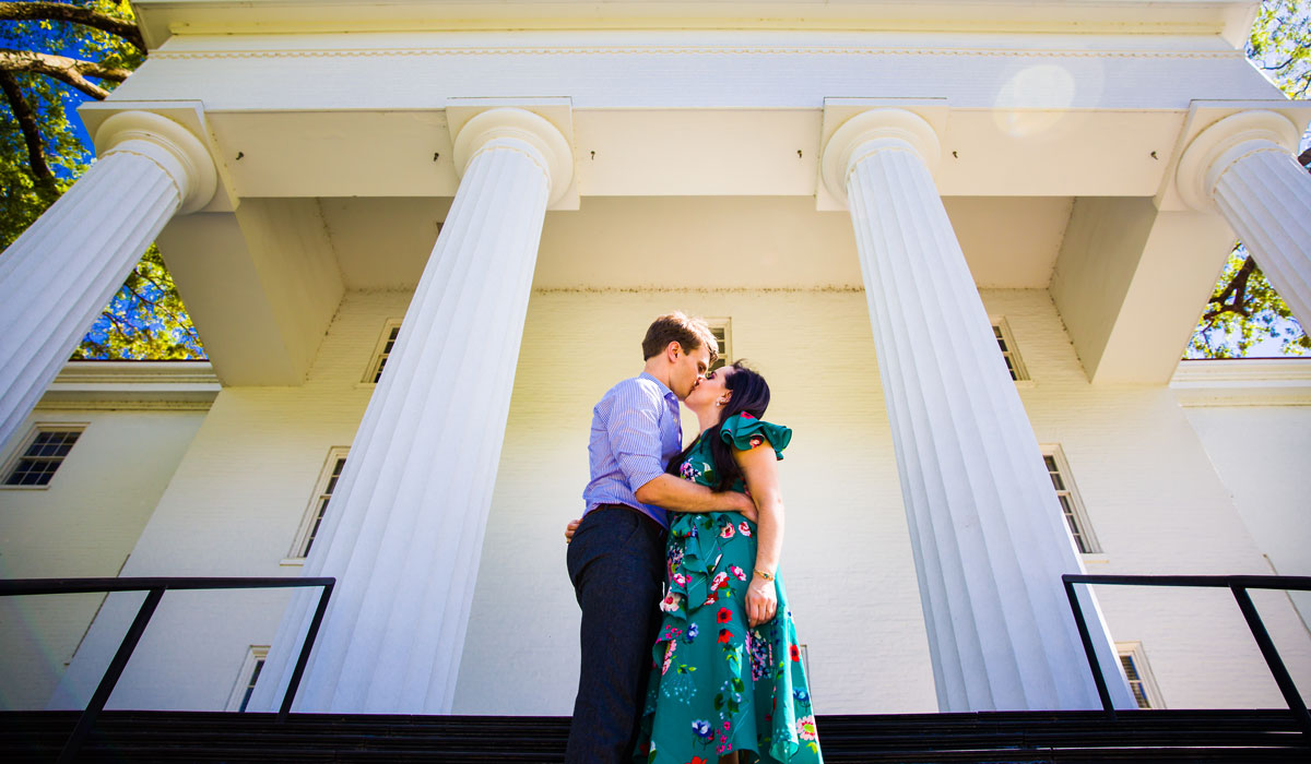 Natasha Maskaly and Robert Finch kissing on the steps of Penn Hall