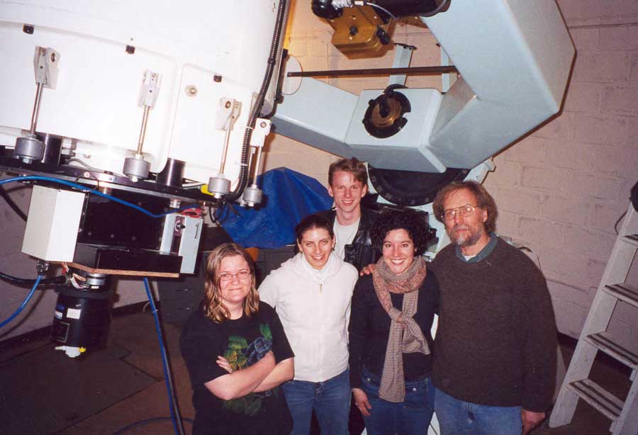 Larry Marschall posing with colleagues at the Lowell Observatory in Arizona