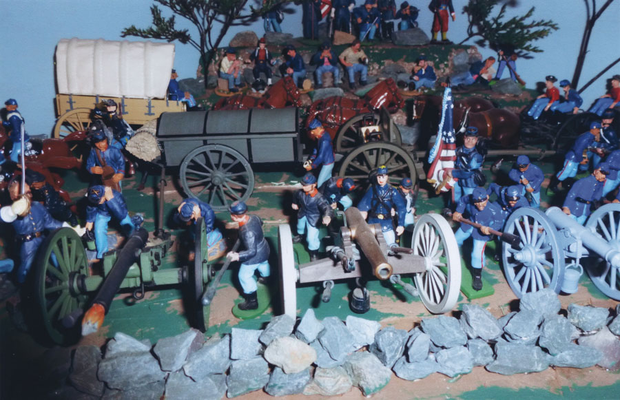 Toy civil war soldiers staged in a battle scene