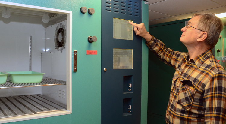 Prof. Sherman Hendrix with growth chamber