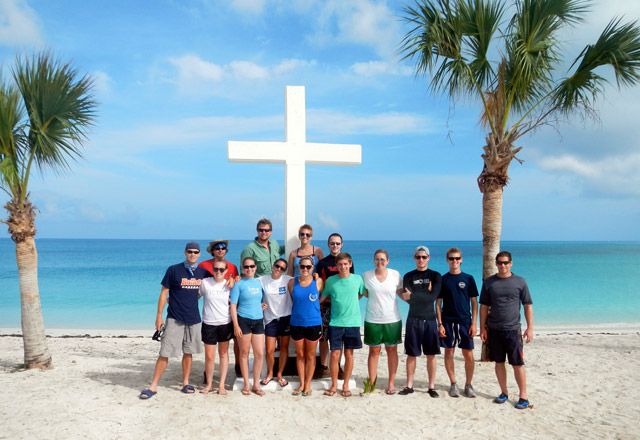 The group in front of the monument on San Salvador Island