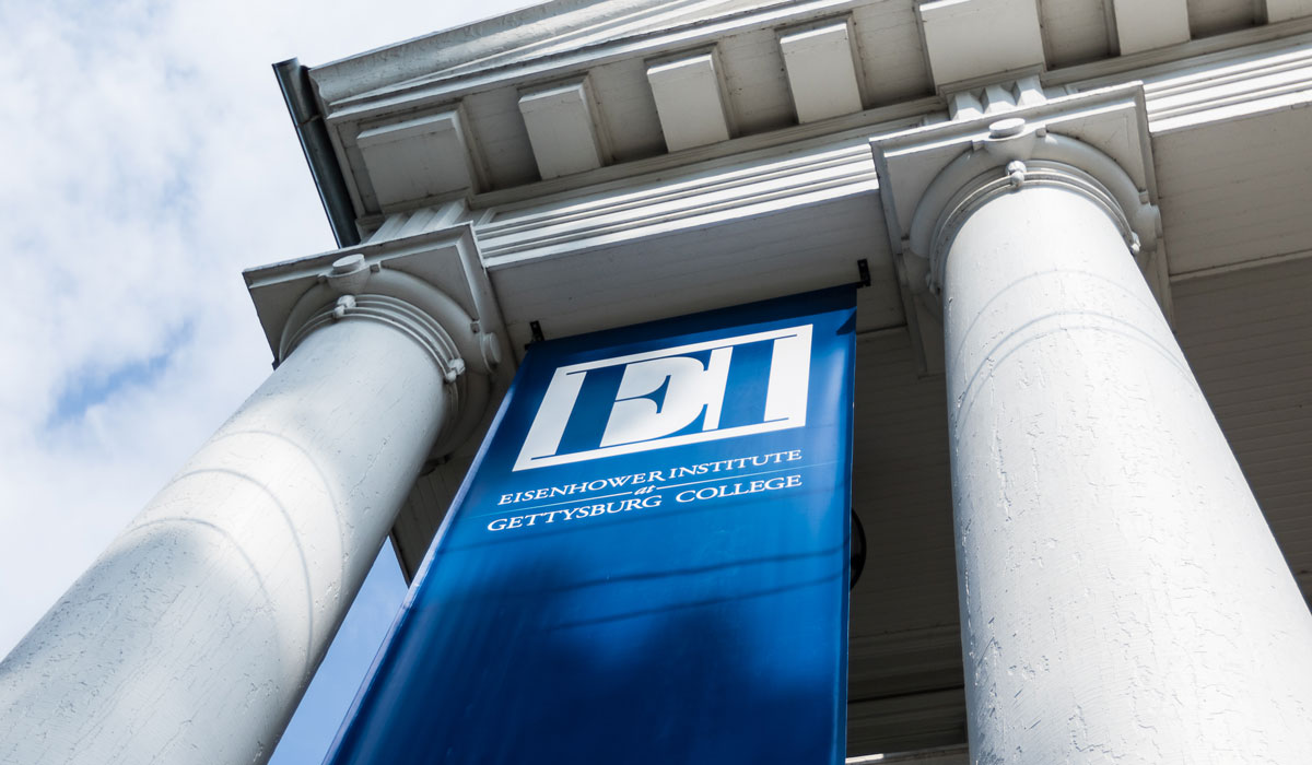 Blue banner on the front of the Eisenhower Institutes building