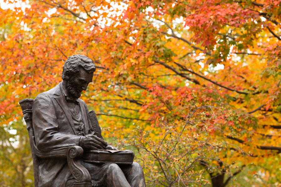 Statue of Abraham Lincoln with Fall leaves in the background
