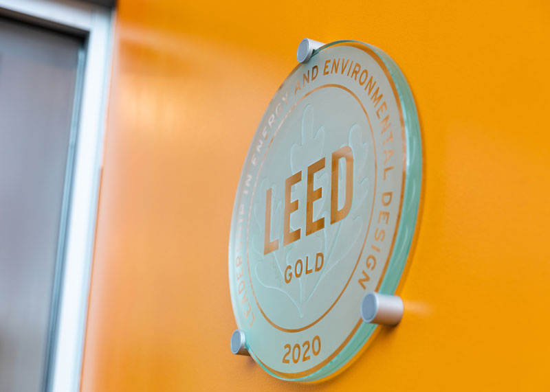 Sign inside of the Janet Morgan Riggs student center that says LEED certified