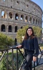 Abigail Coakley in front of the Roman Colosseum