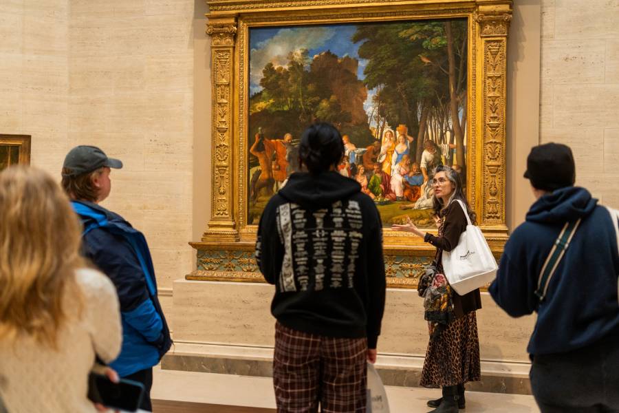 Professor presenting artwork to an audience