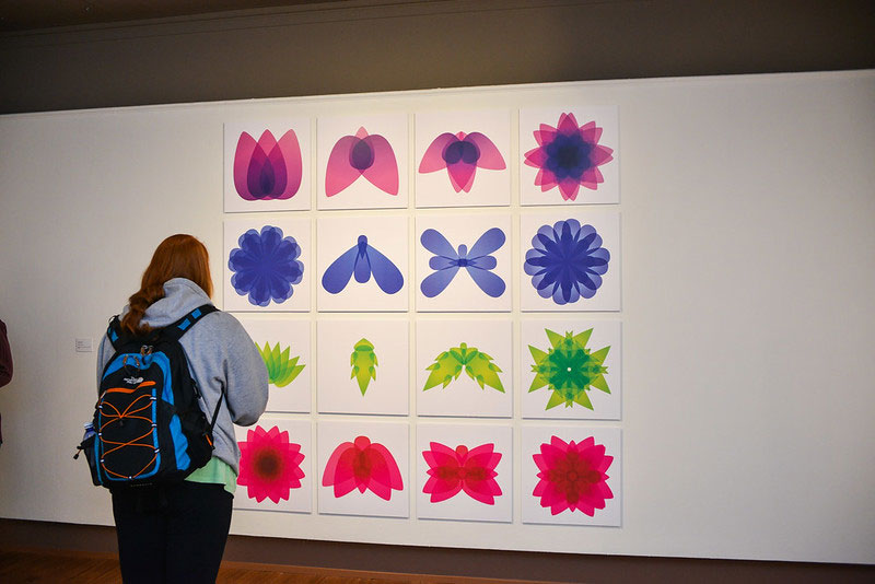 Colorful geomatric prints on the wall of an art gallery