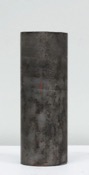 Sculpture of a cylindrical object made of a stone material