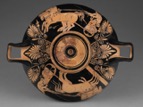 Pottery from ancient Greece with chariots painted on it