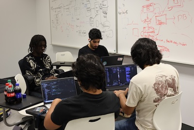 Students working in class on computers