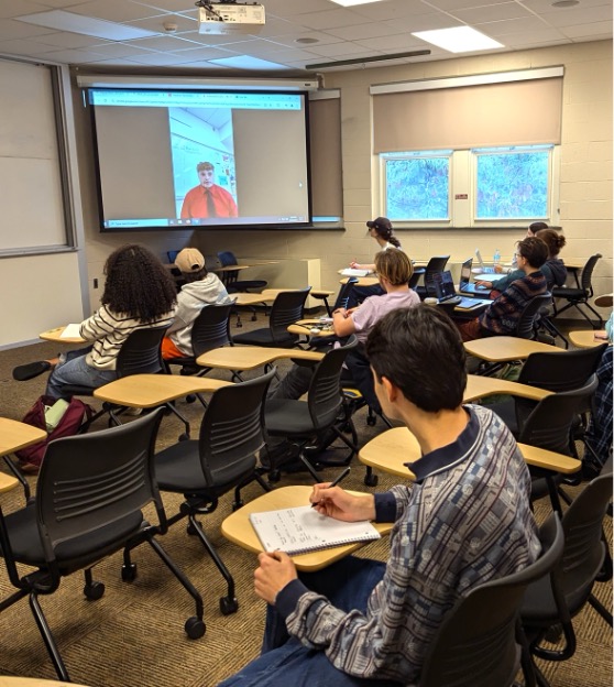 Students in the classroom watching a presentation