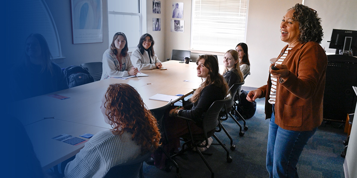 Faculty member teaching students in a classroom
