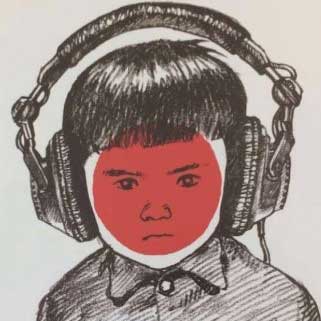 Boy with headphones on and a red dot on his face