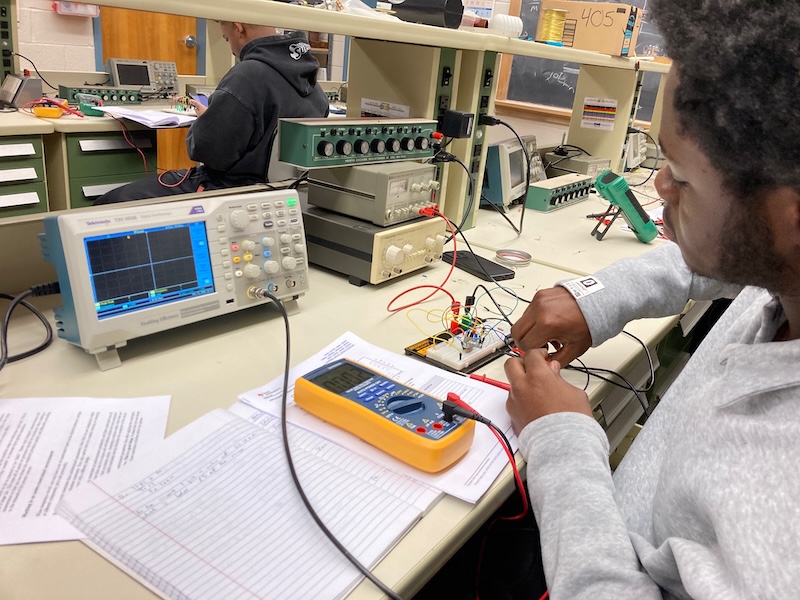 Close-up of a circuit board during a physics experiment