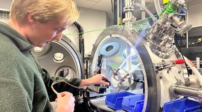 Physics student working in a laboratory