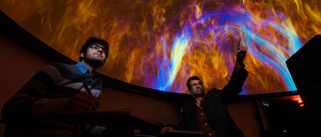 Professor and student in Hatter Planetarium