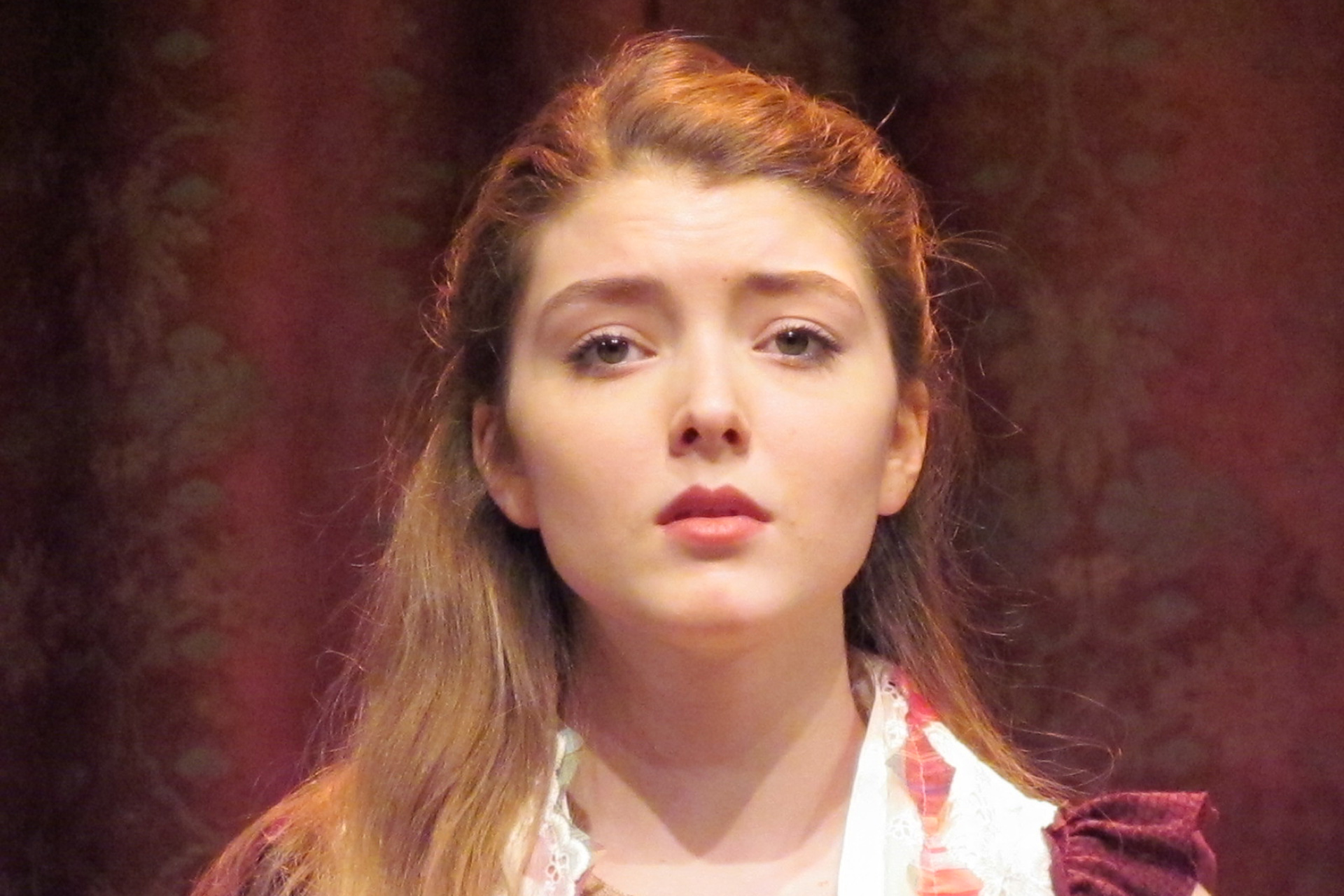 Headshot of actress in period attire