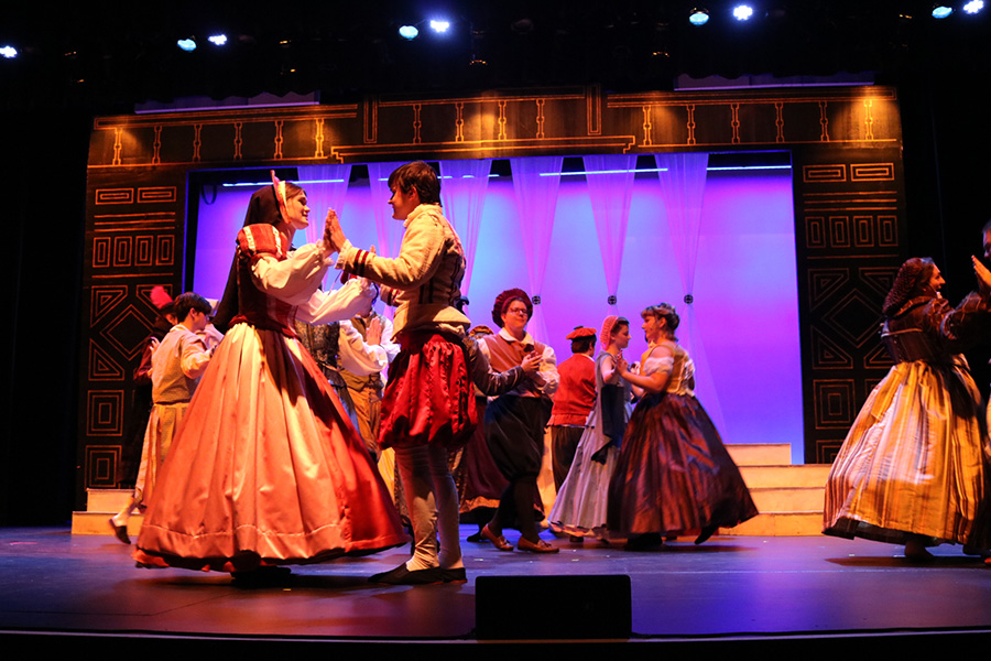 Students on stage dancing