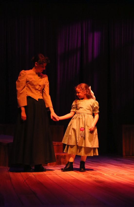 Students on stage performing