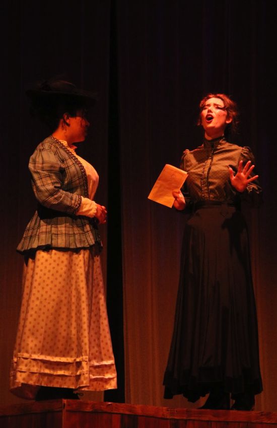 Students on stage performing