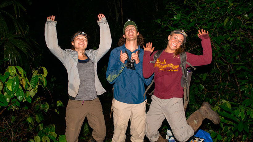 Students posing for photo while conducting research with Alex Trillo