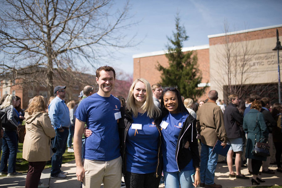 Three Gettysburg College student ambassadors standing next to eachother