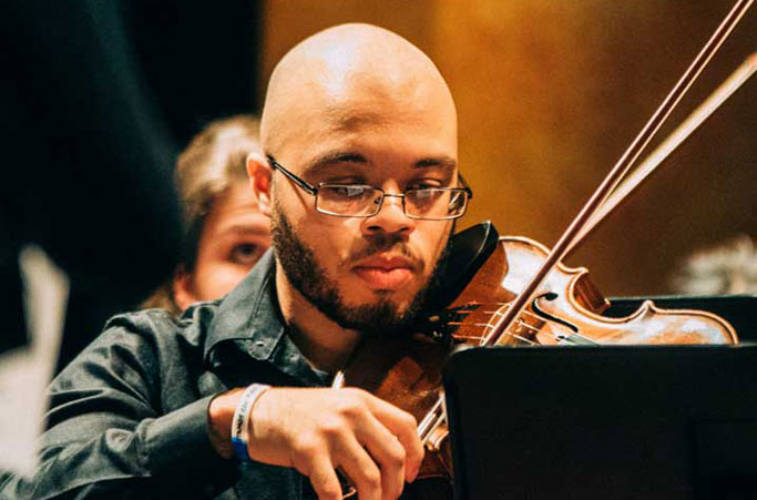 Student playing the violin