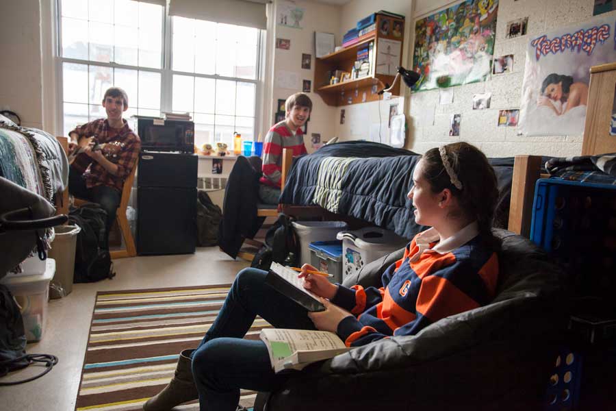 Students sitting and studying in a Gettysburg College dorm room