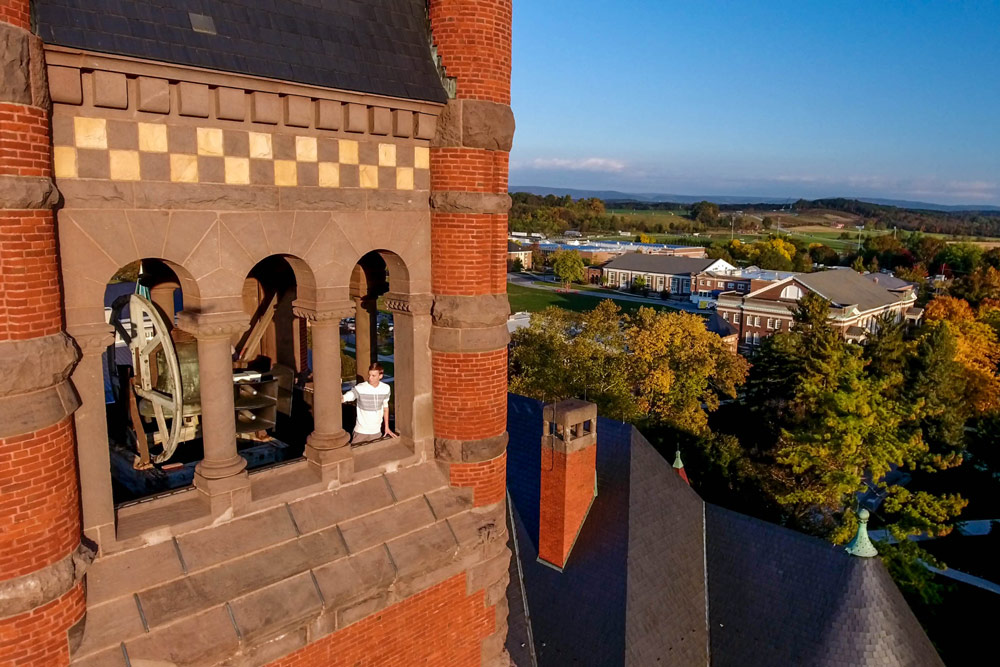 Aerial of student in Glatfelter's bell tower.