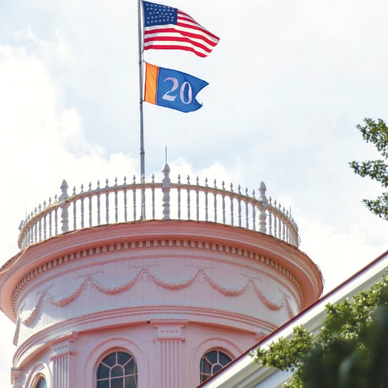 The Class of 2020 flag flies above Penn Hall
