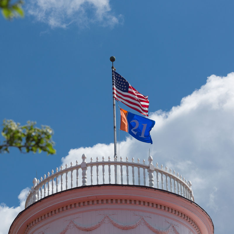 The Penn Hall Cupola with flags on top of it