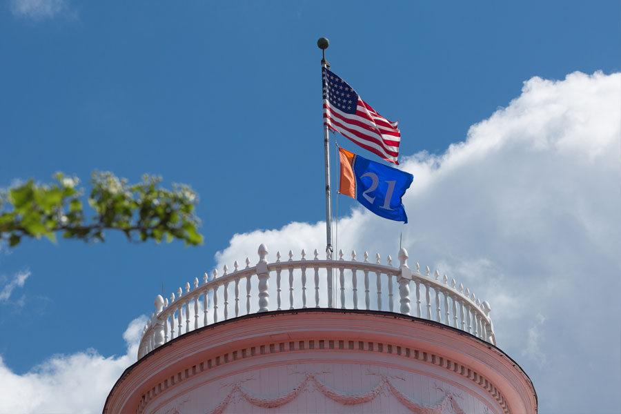 Flags on top of Penn Hall's Cupola