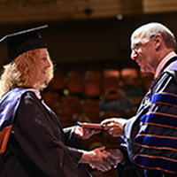 Graduates celebrated, empowered to ‘hold the line’ for education at Inaugural Master’s Commencement
