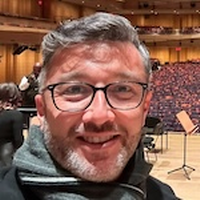Music Prof. César Leal conducts holiday performance at Lincoln Center