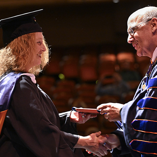 Graduates celebrated, empowered to ‘hold the line’ for education at Inaugural Master’s Commencement
