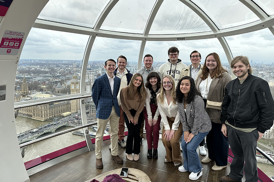 Fielding Fellows inside a glass pod