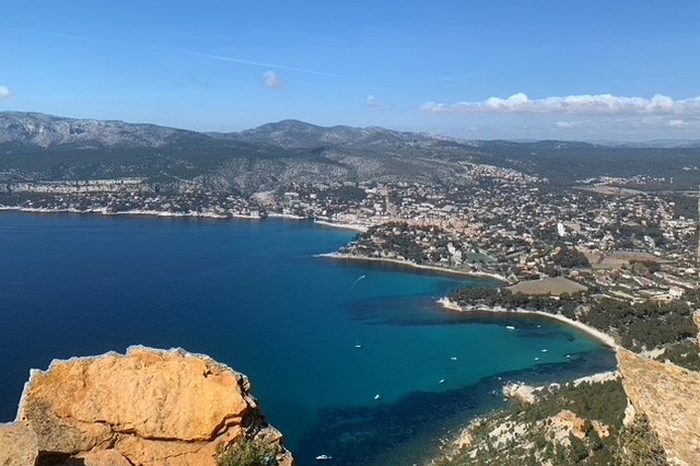 Photo of a city by the ocean with coastline