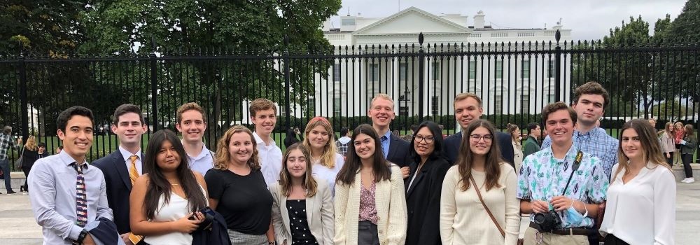 Students standing in front of the White House