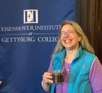 Ann holding her new gettysburg college mug