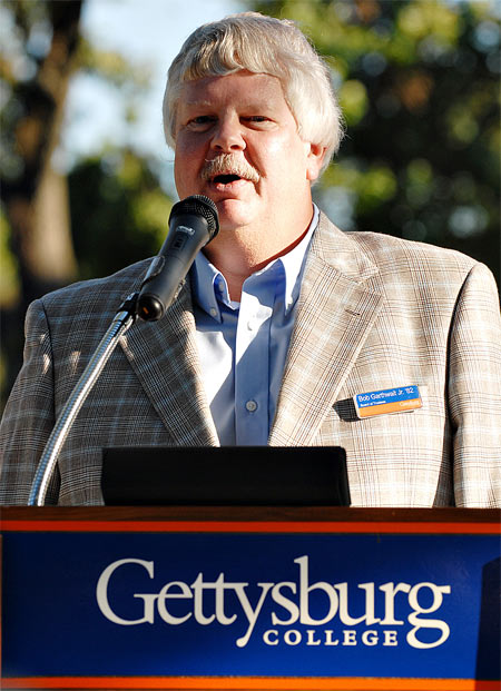 Bob Garthwait Jr. standing at a podium