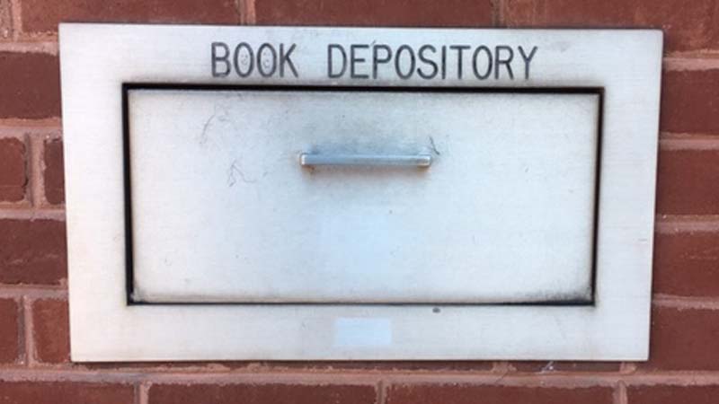 Book return slot located by the Stine Lake library entrance