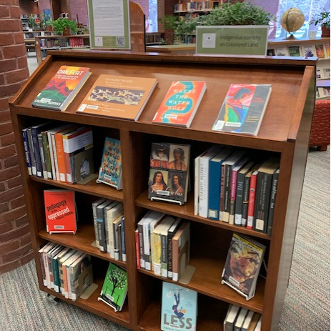 Bookshelf filled with books on indigenous identity