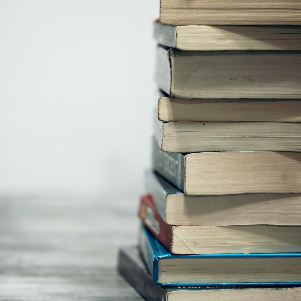 Image of a stack of books from the side.