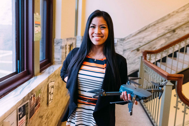 Alyssa Kaewwilai ’20 holding a drone in Glatfelter Hall