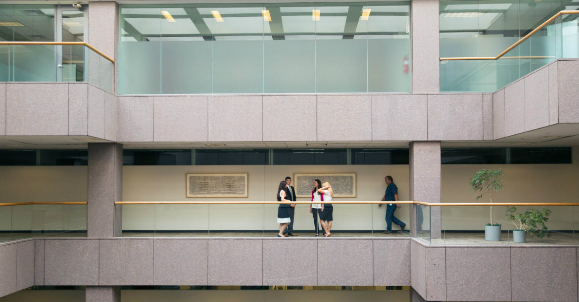 Students walking in office building