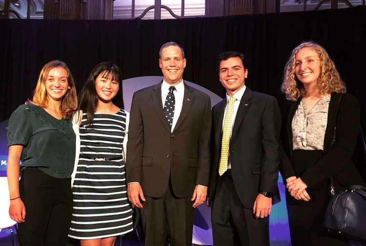 Abigail Major with conference attendees